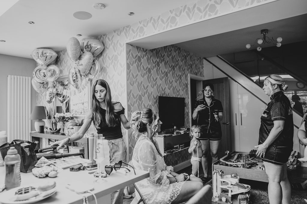 bride and bridesmaids prepping at home