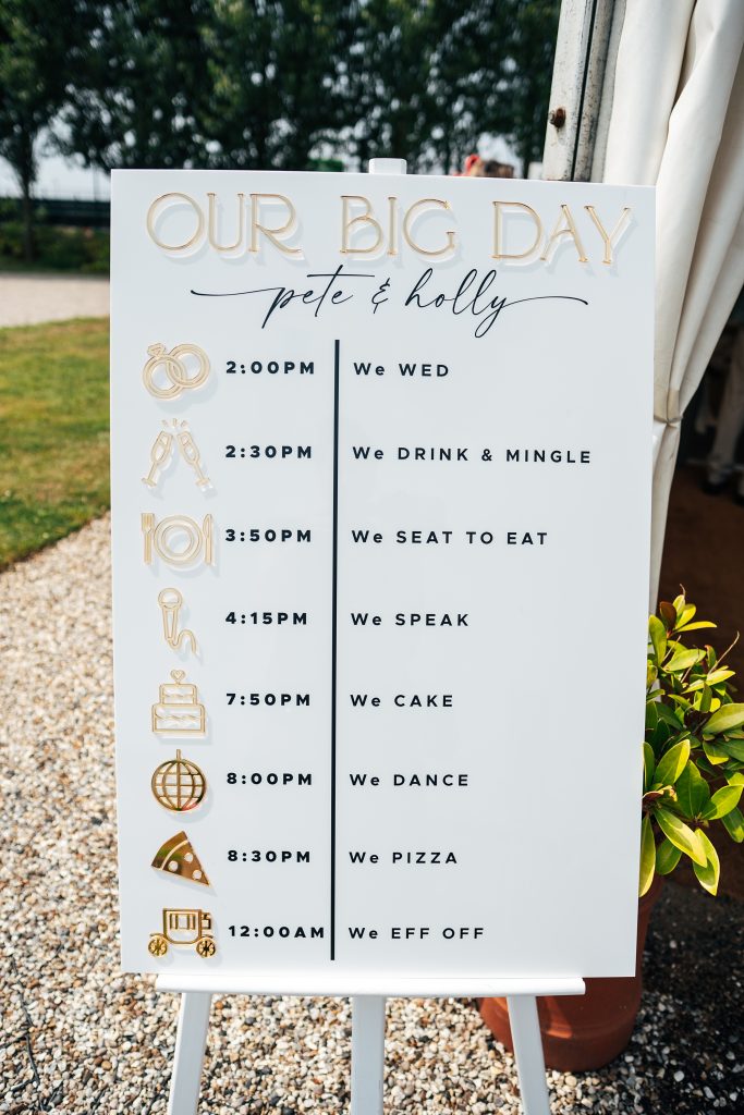 order of the day wedding sign