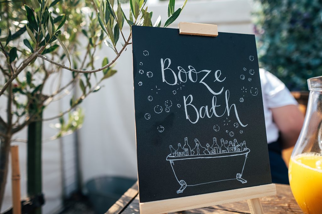 Booze bath sign