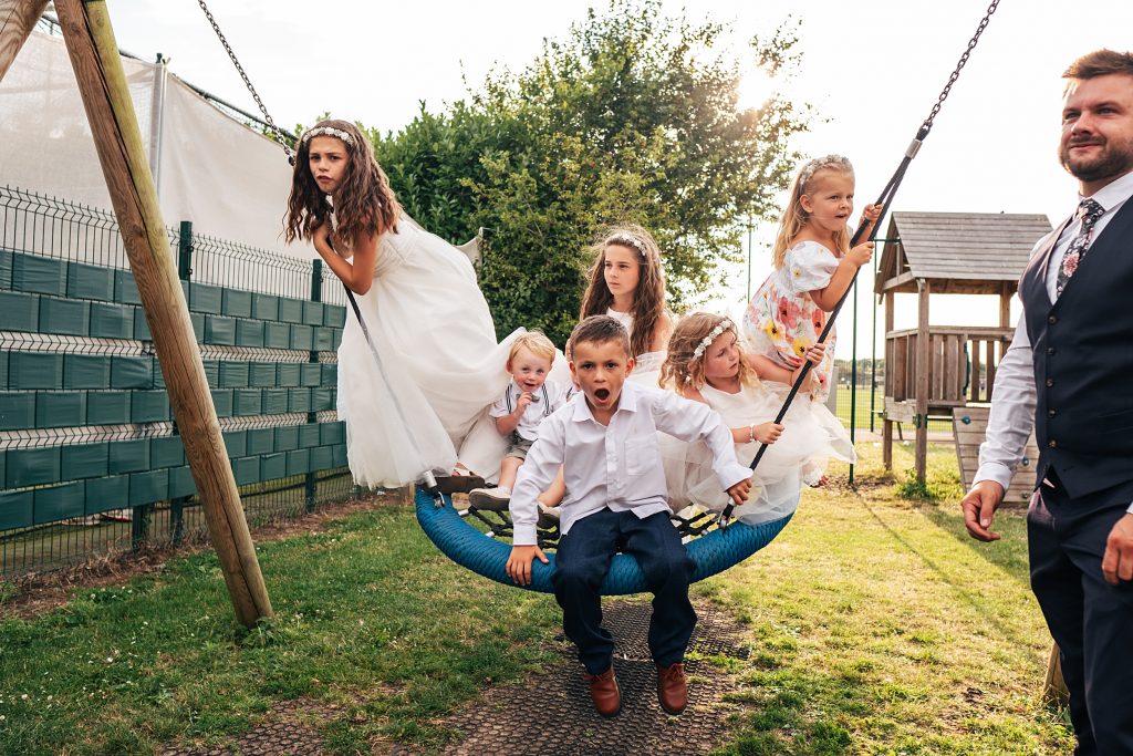 kids on a tyre swing