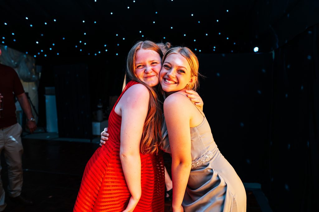 two teen girls on dance floor